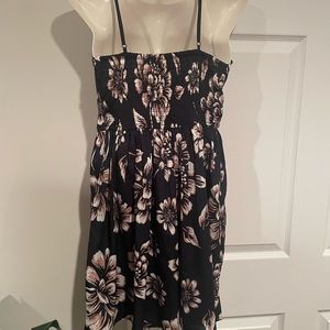 NWOT Small sun dress. Navy blue tan and white flower print.